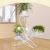 AISHN Blumenstander fur 3 Blumentopfe, 3 Etagen, geschwungenes, dekoratives Design, Metall, Garten/Terrasse - 